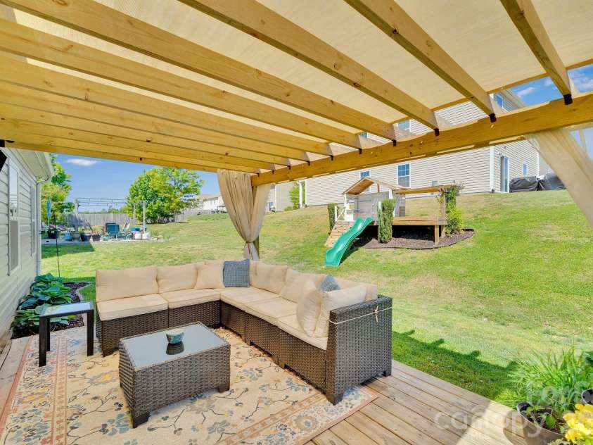 2006 Greenbrook Trail, Dallas, NC 28034.  MLS# CAR4372375, YatesRealty ID 25969. Lovely covered back patio
