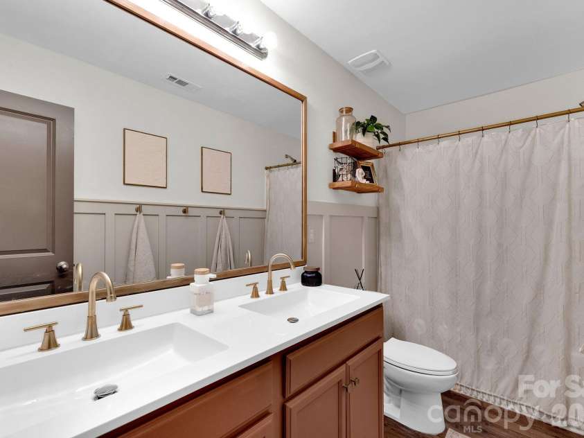 2006 Greenbrook Trail, Dallas, NC 28034.  MLS# CAR4372375, YatesRealty ID 25969. Second Bathroom has double vanity and more owner customizations