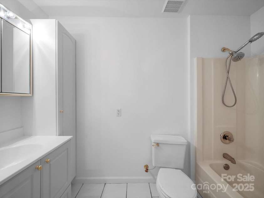 2739 Pine Knoll Court, Gastonia, NC 28054.  MLS# CAR4273795, YatesRealty ID 25972. 2nd living quarters bathroom