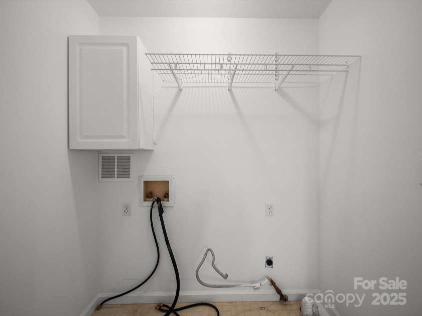 2739 Pine Knoll Court, Gastonia, NC 28054.  MLS# CAR4273795, YatesRealty ID 25972. Laundry closet