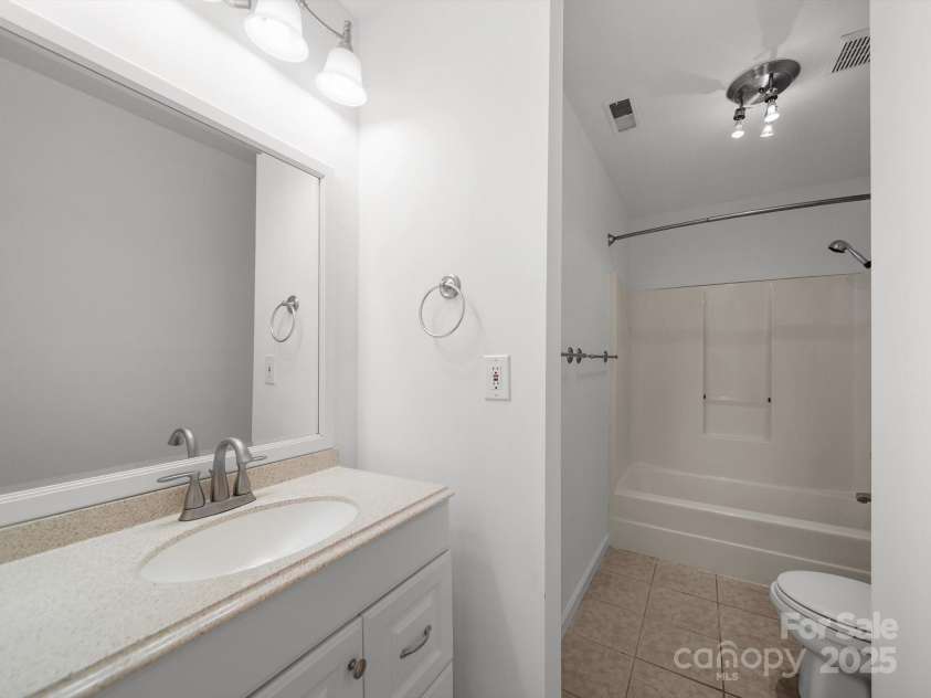2739 Pine Knoll Court, Gastonia, NC 28054.  MLS# CAR4273795, YatesRealty ID 25972. Upstairs bathroom