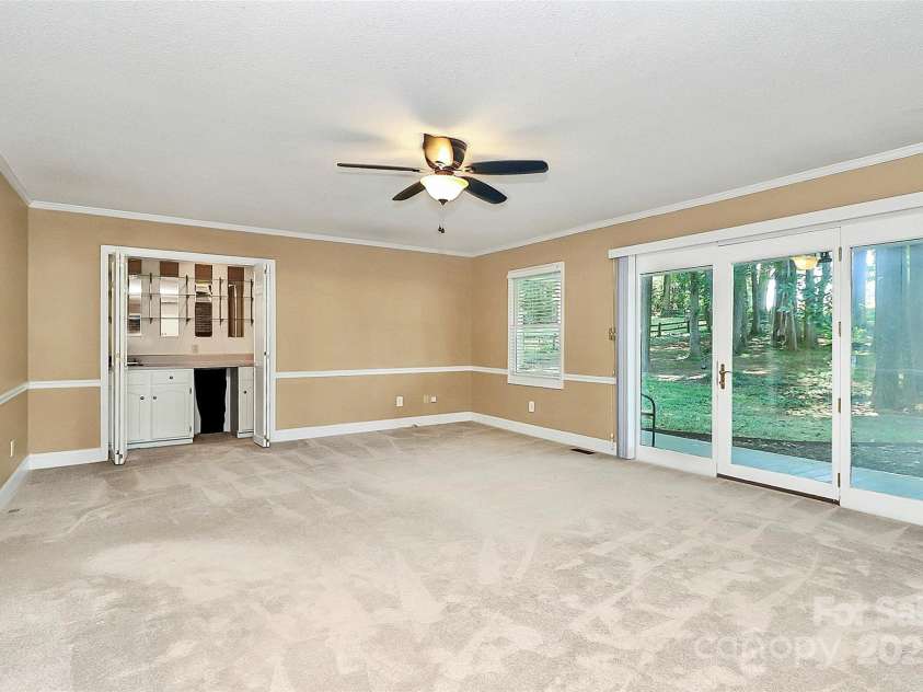 7852 Golf Course Drive, Denver, NC 28037.  MLS# CAR4264483, YatesRealty ID 25973. GREAT ROOM with CLOSET BAR
