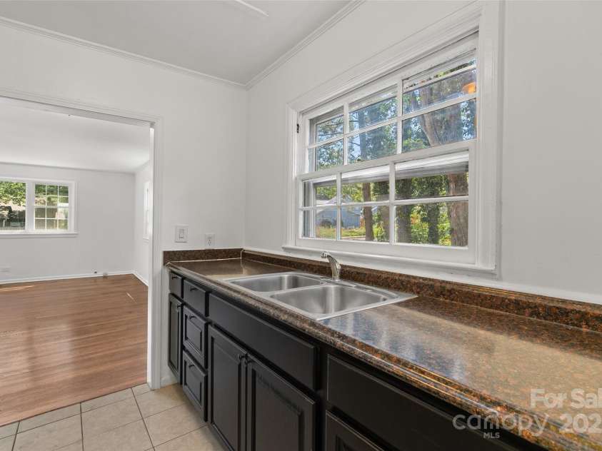 167 Mount Clare Avenue, Asheville, NC 28801.  MLS# CAR4272569, YatesRealty ID 25978. Unit A, lower level