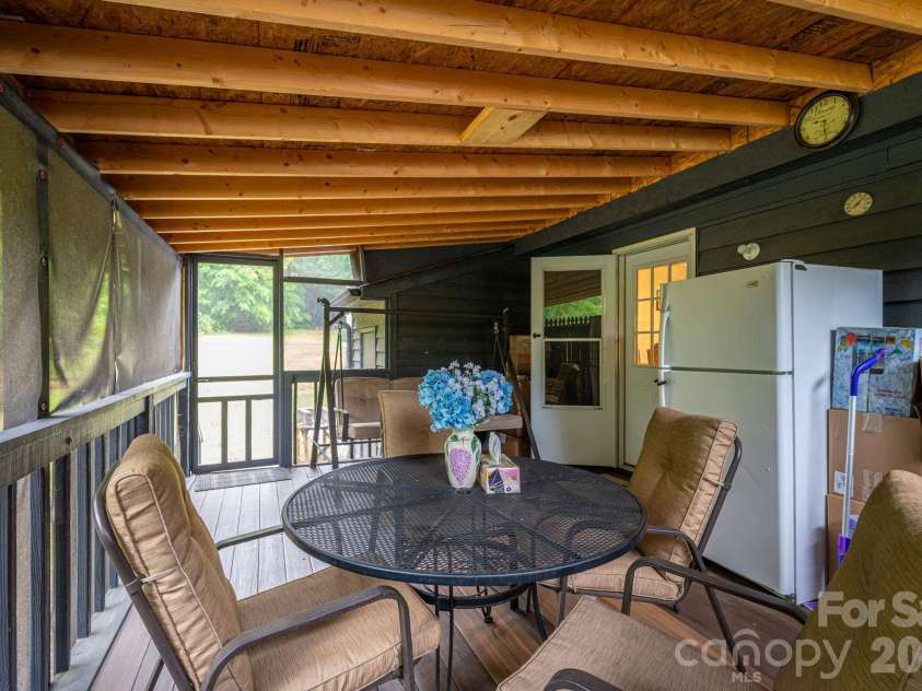 1841 Oak Hollow Road, Gastonia, NC 28054.  MLS# CAR4375695, YatesRealty ID 25980. Covered screened deck