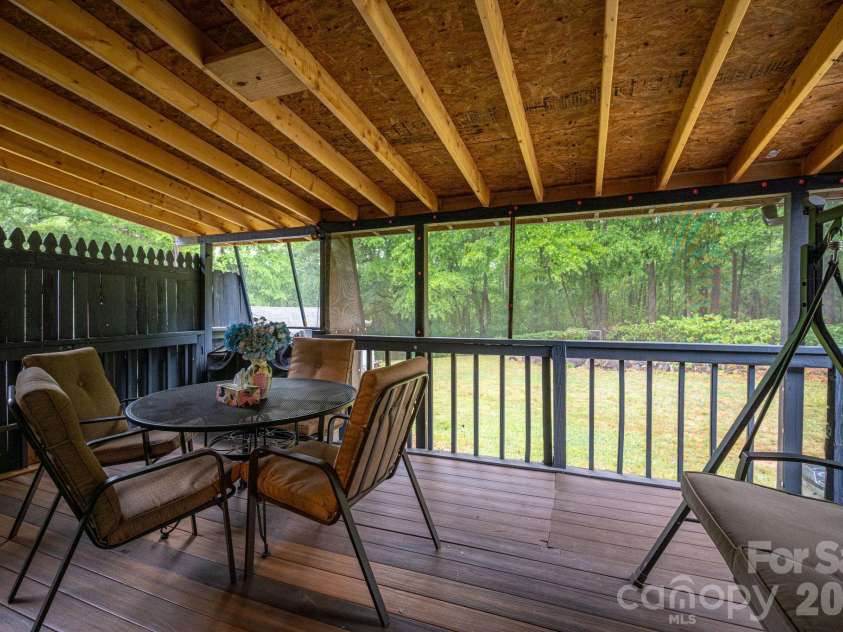 1841 Oak Hollow Road, Gastonia, NC 28054.  MLS# CAR4375695, YatesRealty ID 25980. Covered screened deck
