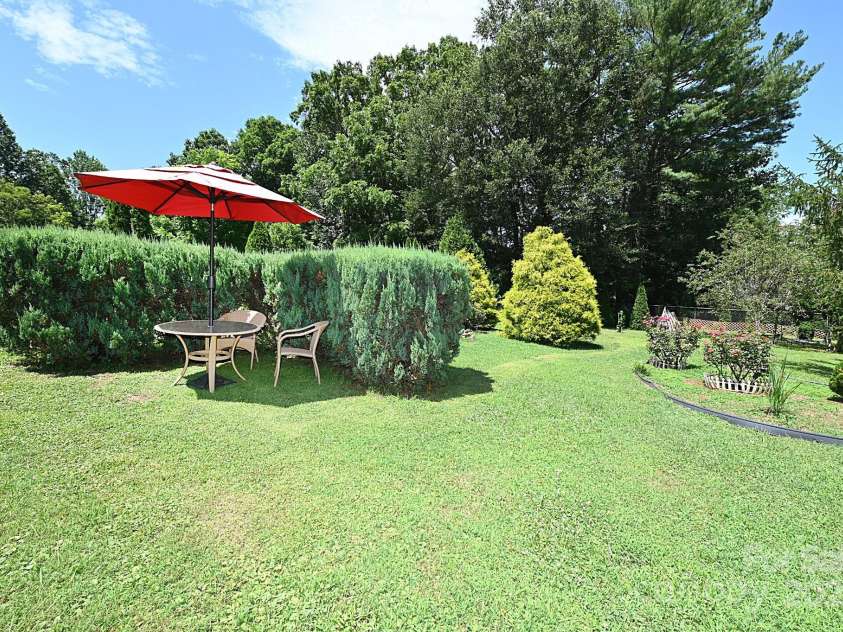 209 Northwood Drive, Morganton, NC 28655.  MLS# CAR4280216, YatesRealty ID 25981. Enjoy your dinner outdoors in the seclusion of your own private backyard oasis