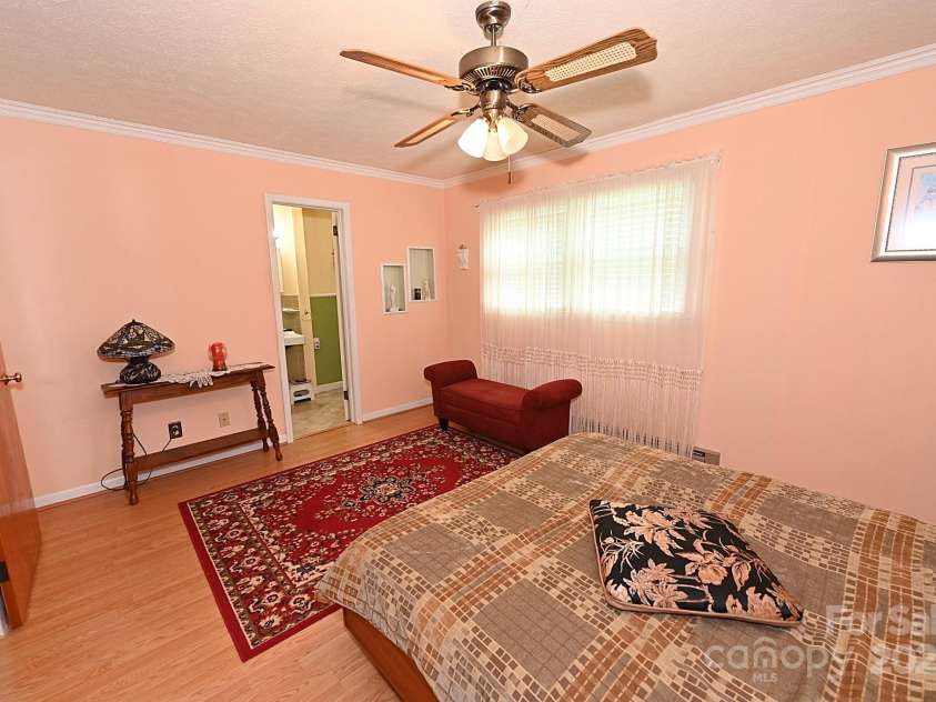 209 Northwood Drive, Morganton, NC 28655.  MLS# CAR4280216, YatesRealty ID 25981. Primary bedroom with ensuite full bathroom