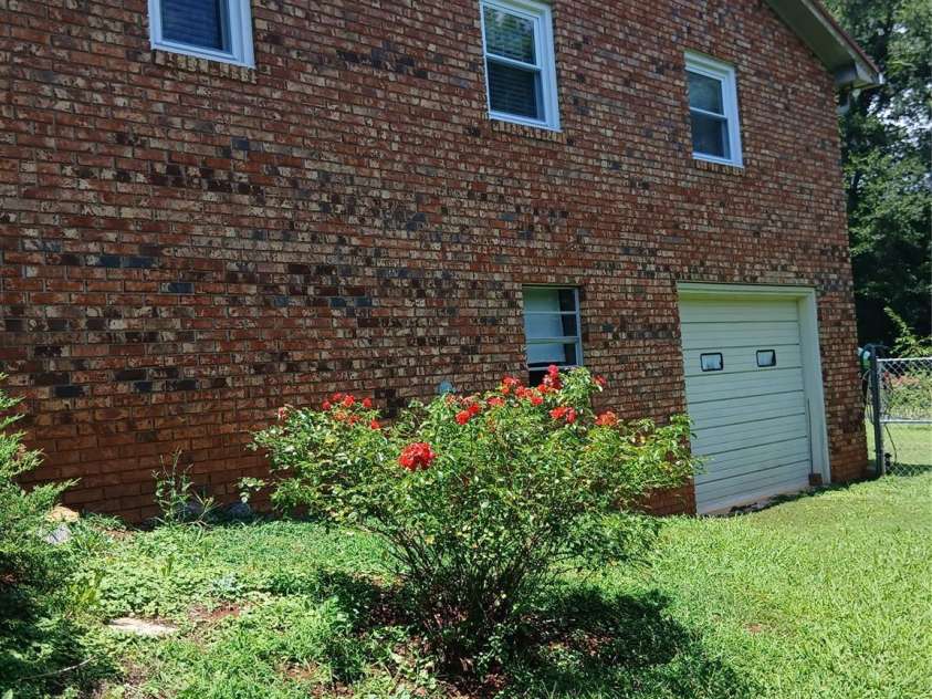 209 Northwood Drive, Morganton, NC 28655.  MLS# CAR4280216, YatesRealty ID 25981. Right side of the home offers second garage at the basement level
