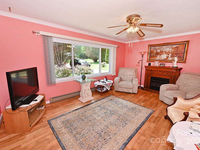 209 Northwood Drive, Morganton, NC 28655.  MLS# CAR4280216, YatesRealty ID 25981. The gas fireplace will add a sense of coziness during the chilly months of the year