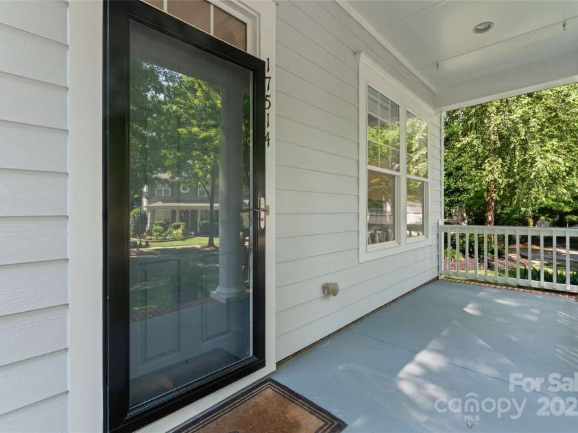 17514 Harbor Walk Drive, Cornelius, NC 28031.  MLS# CAR4276701, YatesRealty ID 25986. Covered front porch