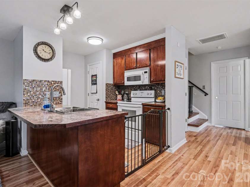 3240 Carlyle Drive, Concord, NC 28027.  MLS# CAR4348837, YatesRealty ID 25988. Kitchen with Pantry