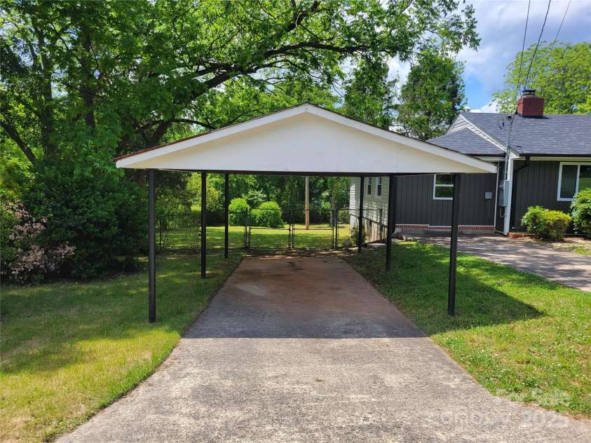 423 Rhyne Street, Dallas, NC 28034.  MLS# CAR4255293, YatesRealty ID 25988. Detached Carport