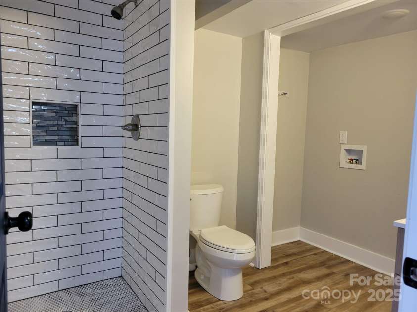 423 Rhyne Street, Dallas, NC 28034.  MLS# CAR4255293, YatesRealty ID 25988. Full Bath Walk-in-Shower / Laundry Area