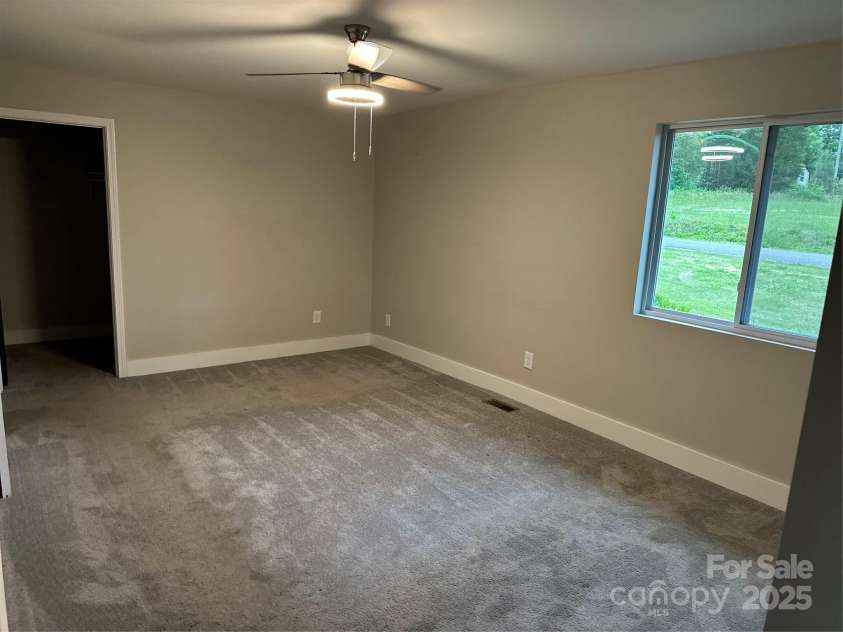 423 Rhyne Street, Dallas, NC 28034.  MLS# CAR4255293, YatesRealty ID 25988. Primary Bedroom showing Windows