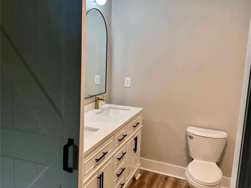 423 Rhyne Street, Dallas, NC 28034.  MLS# CAR4255293, YatesRealty ID 25988. Primary Full Bath with Barn Door
