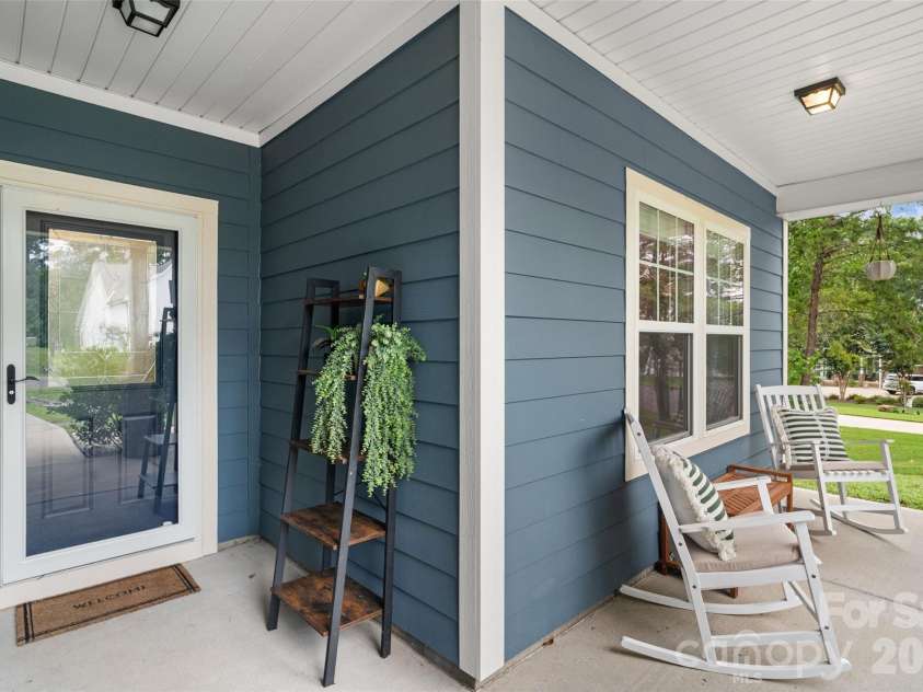 5299 Admirals Landing, Lancaster, SC 29720.  MLS# CAR4335970, YatesRealty ID 2599. Rocking Chair Front Porch looks towards the lake