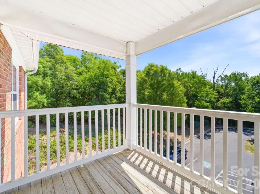 9976 Hyde Glen Court, Charlotte, NC 28262.  MLS# CAR4377383, YatesRealty ID 25991. Covered deck