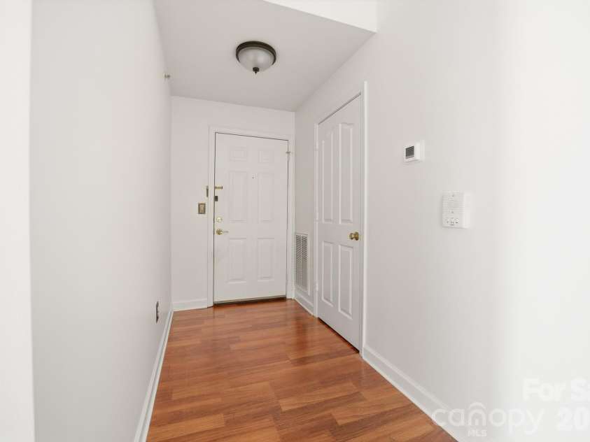 9976 Hyde Glen Court, Charlotte, NC 28262.  MLS# CAR4377383, YatesRealty ID 25991. Entryway with closet