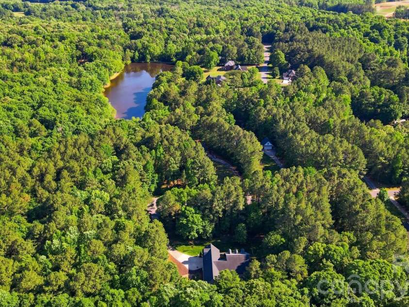 2043 Standing Timber Road, Lancaster, SC 29720.  MLS# CAR4355807, YatesRealty ID 25994. Drone to see community lake.