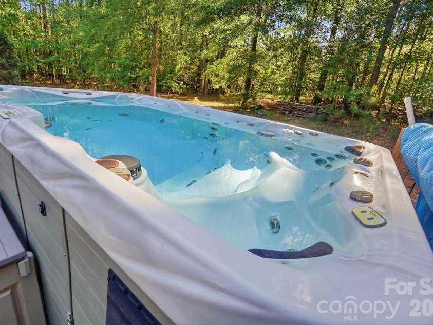 2043 Standing Timber Road, Lancaster, SC 29720.  MLS# CAR4355807, YatesRealty ID 25994. Swim spa to convey