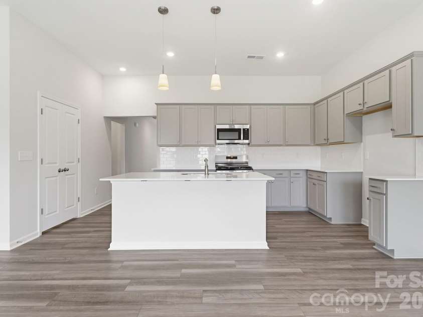223 Rodeo Drive, Shelby, NC 28150.  MLS# CAR4369805, YatesRealty ID 26002. Great Room into Kitchen