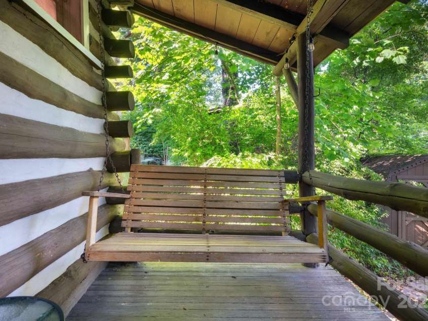 15 & 16 Cottage Drive, Asheville, NC 28805.  MLS# CAR4281267, YatesRealty ID 26004. 15 Cottage -Deck Swing