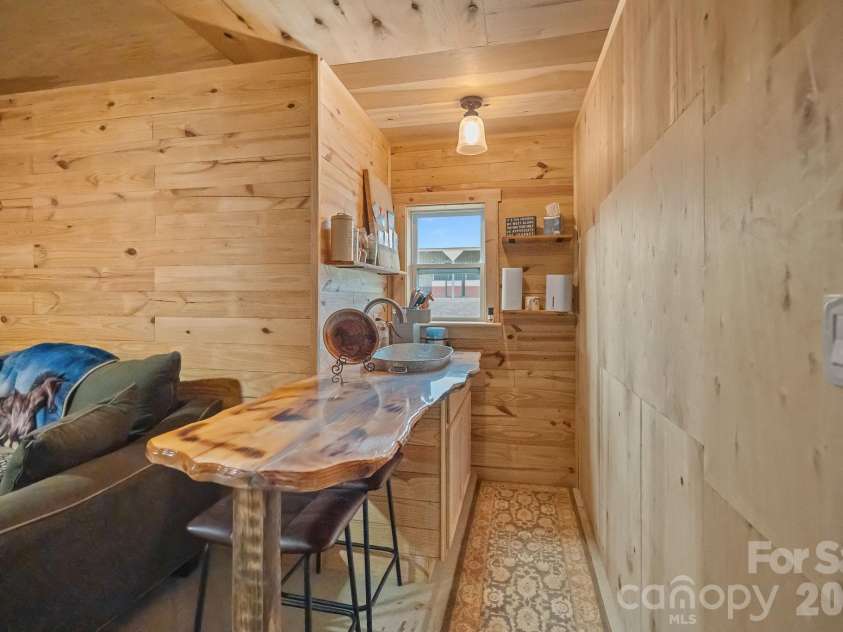 2151 Brown Chapel Road, Catawba, NC 28609.  MLS# CAR4375551, YatesRealty ID 26005. Barn suite dining bar with sink.