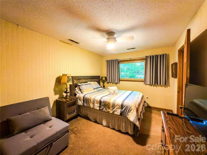 222 West Lake Drive, Lake Lure, NC 28746.  MLS# CAR4294335, YatesRealty ID 2601.  Bedroom Second Level