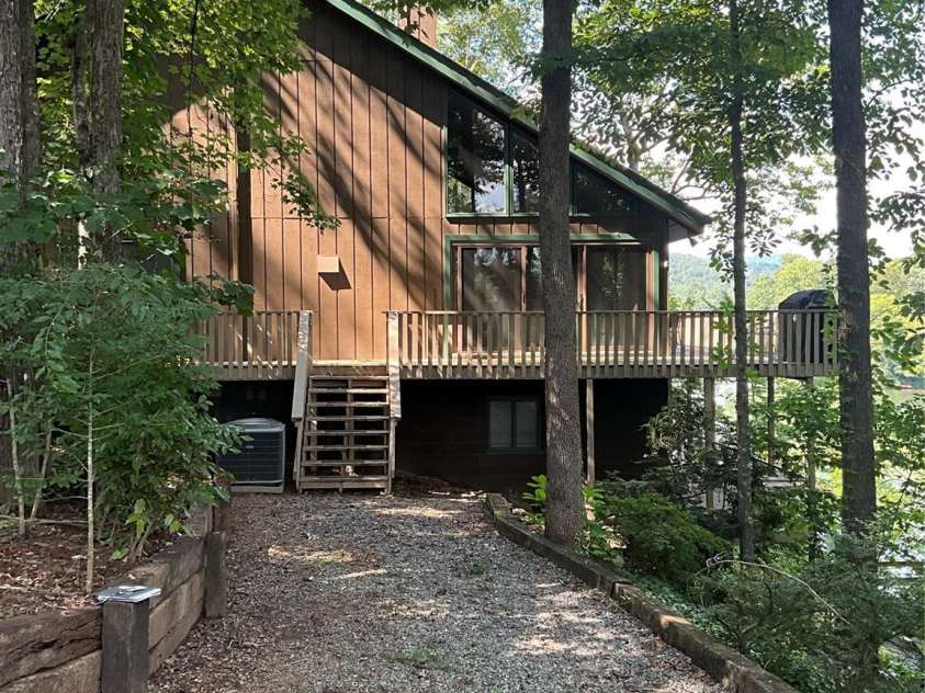 222 West Lake Drive, Lake Lure, NC 28746.  MLS# CAR4294335, YatesRealty ID 2601. Side parking view