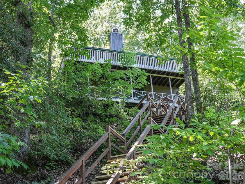 222 West Lake Drive, Lake Lure, NC 28746.  MLS# CAR4294335, YatesRealty ID 2601. Staircase going down to the dock