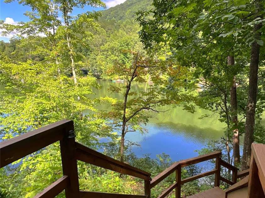 222 West Lake Drive, Lake Lure, NC 28746.  MLS# CAR4294335, YatesRealty ID 2601. Stairs going down to dock