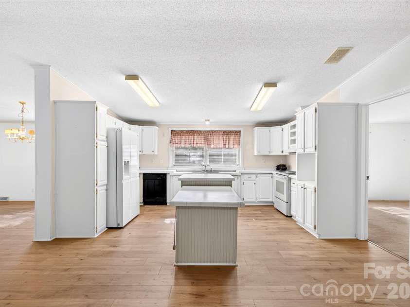 388 Chinquapin Lane, Mt Ulla, NC 28125.  MLS# CAR4344888, YatesRealty ID 2601. Kitchen features large prep island and storage!