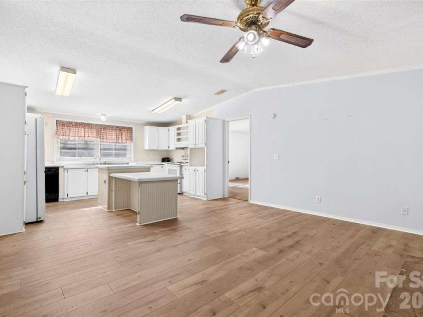 388 Chinquapin Lane, Mt Ulla, NC 28125.  MLS# CAR4344888, YatesRealty ID 2601. Kitchen is open to Keeping room