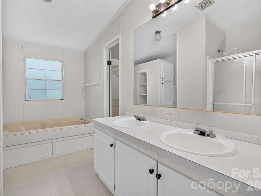 388 Chinquapin Lane, Mt Ulla, NC 28125.  MLS# CAR4344888, YatesRealty ID 2601. Primary Bathroom