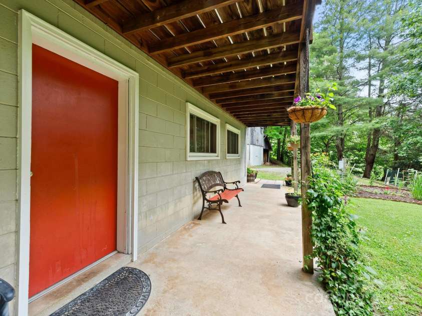1400 Watershed Road, Mars Hill, NC 28754.  MLS# CAR4280588, YatesRealty ID 26016. Red door is to the entrance into living room in the finished basement.