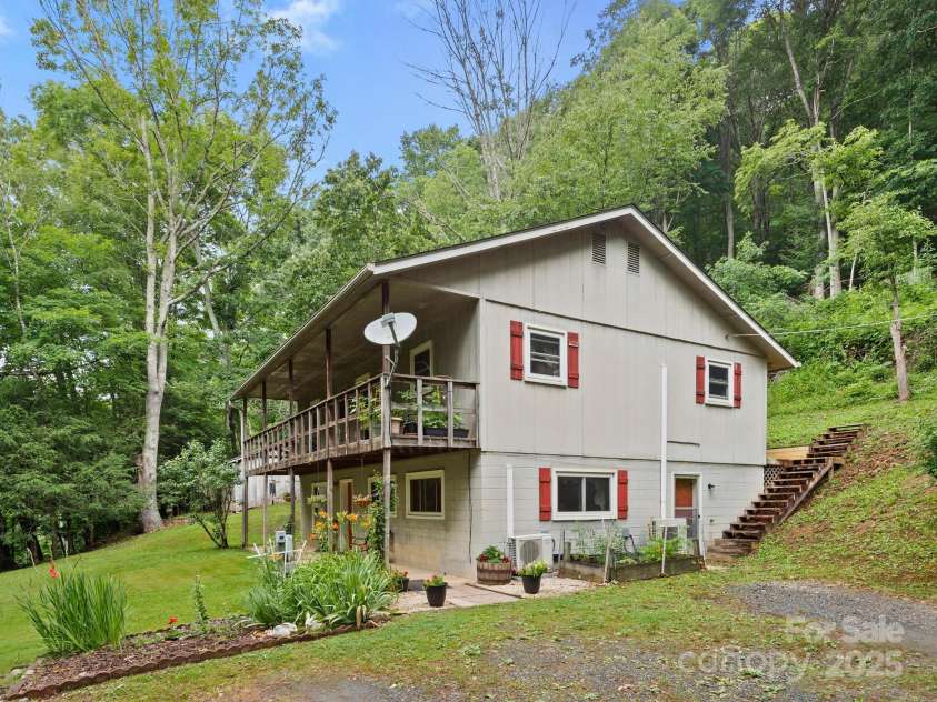 1400 Watershed Road, Mars Hill, NC 28754.  MLS# CAR4280588, YatesRealty ID 26016. This photo was taken standing in the driveway looking toward the house. Every inch of this home is very useful in so many ways.