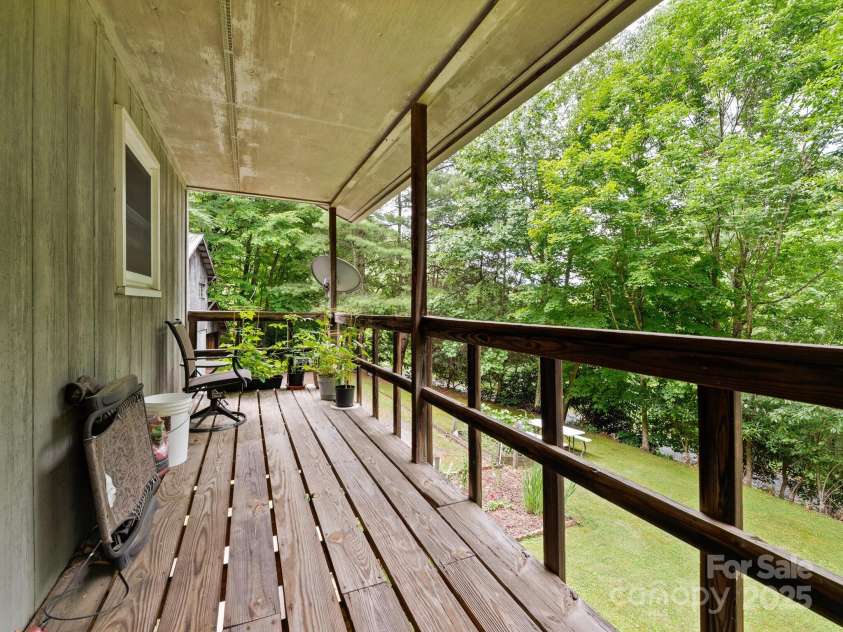 1400 Watershed Road, Mars Hill, NC 28754.  MLS# CAR4280588, YatesRealty ID 26016. Upper level covered porch on front of home with exterior door located at the office shown in prior photo.