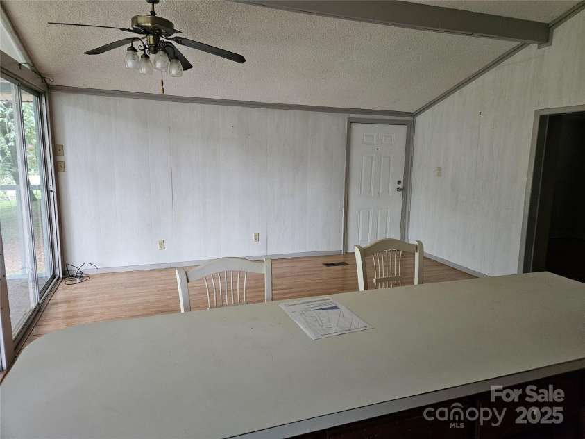 6813 Navajo Trail, Sherrills Ford, NC 28673.  MLS# CAR4253996, YatesRealty ID 26022. In Kitchen Looking out into Living Room