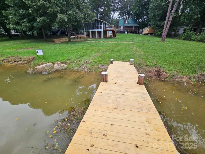 6813 Navajo Trail, Sherrills Ford, NC 28673.  MLS# CAR4253996, YatesRealty ID 26022. On Pier Looking at House