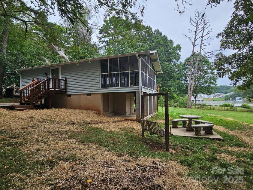 6813 Navajo Trail, Sherrills Ford, NC 28673.  MLS# CAR4253996, YatesRealty ID 26022. Side of Cabin
