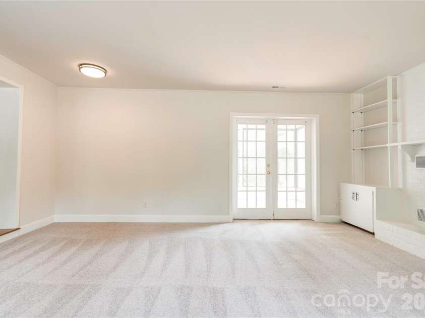 809 Forest Hill Drive, Shelby, NC 28150.  MLS# CAR4385208, YatesRealty ID 26022. Glass doors open to a sunroom.
