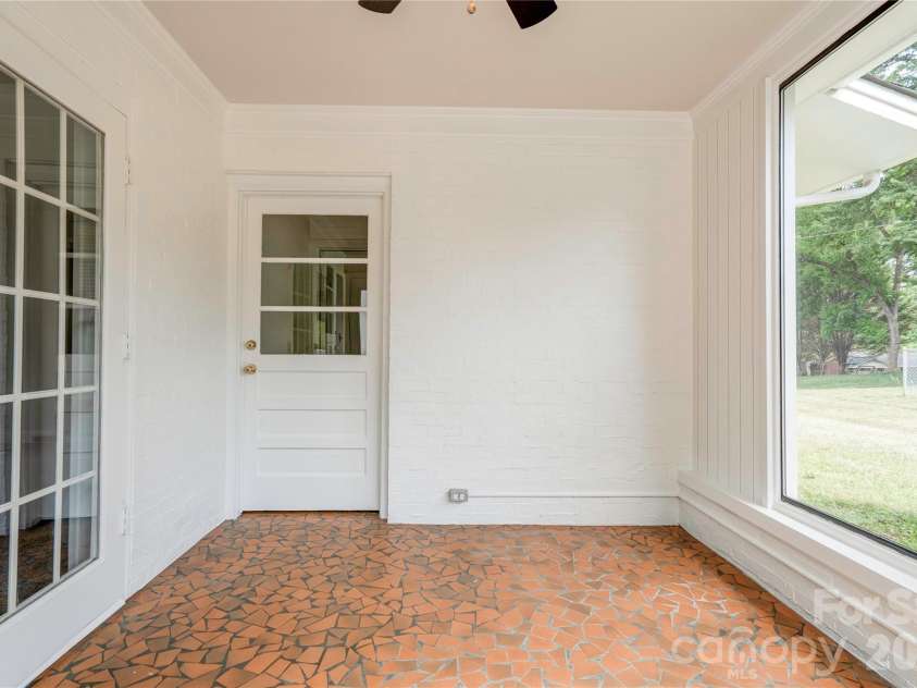 809 Forest Hill Drive, Shelby, NC 28150.  MLS# CAR4385208, YatesRealty ID 26022. Sunroom just off the den. 