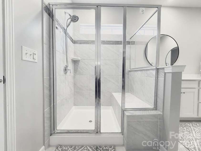 133 Dubois Drive, Mooresville, NC 28115.  MLS# CAR4385775, YatesRealty ID 26027. Sit Down Shower
