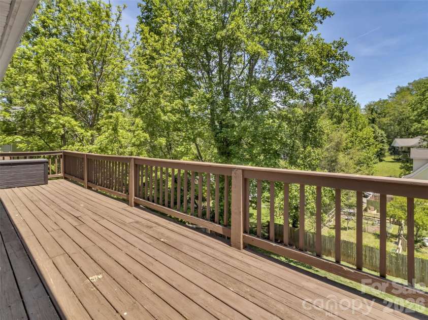 252 Oak Park Drive, Clyde, NC 28721.  MLS# CAR4381377, YatesRealty ID 26039. Back deck