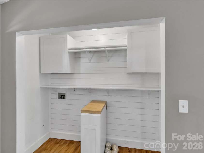 252 Oak Park Drive, Clyde, NC 28721.  MLS# CAR4381377, YatesRealty ID 26039. Custom Laundry area