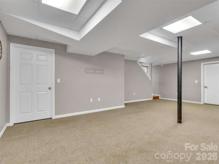 252 Oak Park Drive, Clyde, NC 28721.  MLS# CAR4381377, YatesRealty ID 26039. Family room