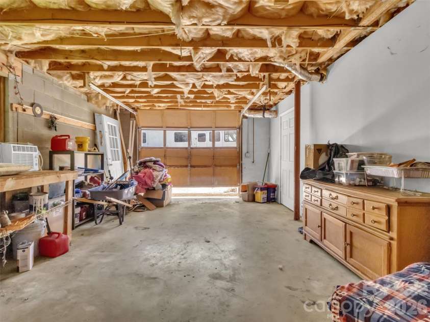 252 Oak Park Drive, Clyde, NC 28721.  MLS# CAR4381377, YatesRealty ID 26039. Garage in basement
