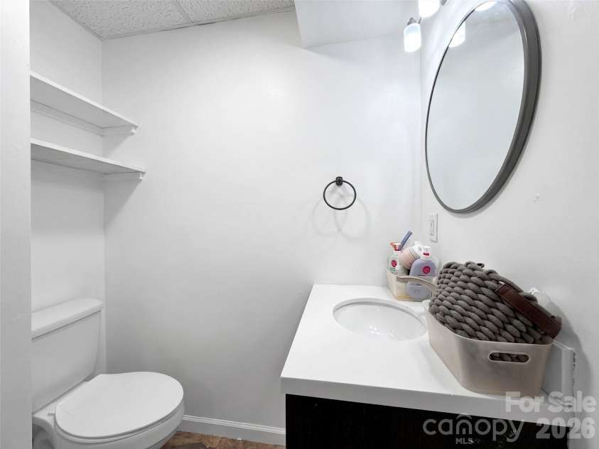 252 Oak Park Drive, Clyde, NC 28721.  MLS# CAR4381377, YatesRealty ID 26039. Lower level bathroom