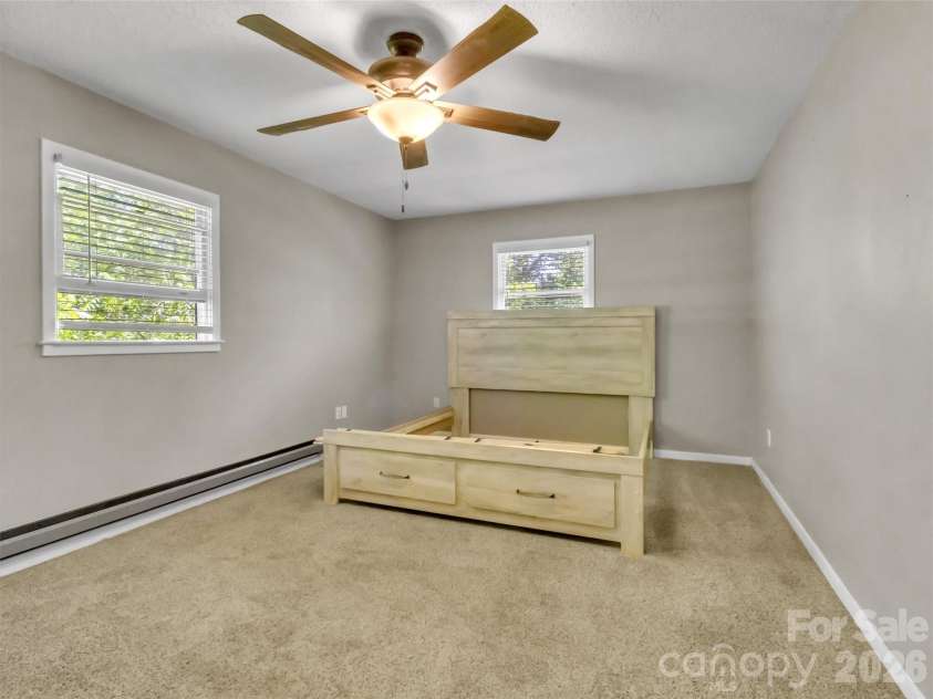 252 Oak Park Drive, Clyde, NC 28721.  MLS# CAR4381377, YatesRealty ID 26039. Primary bedroom