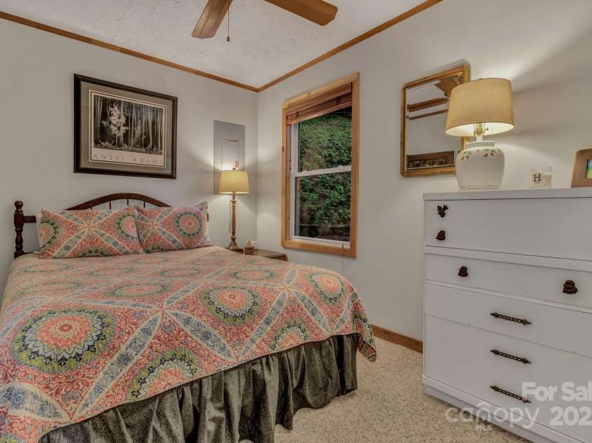 535 Rocky Top Road, Maggie Valley, NC 28751.  MLS# CAR4277929, YatesRealty ID 26043. Primary bedroom main level